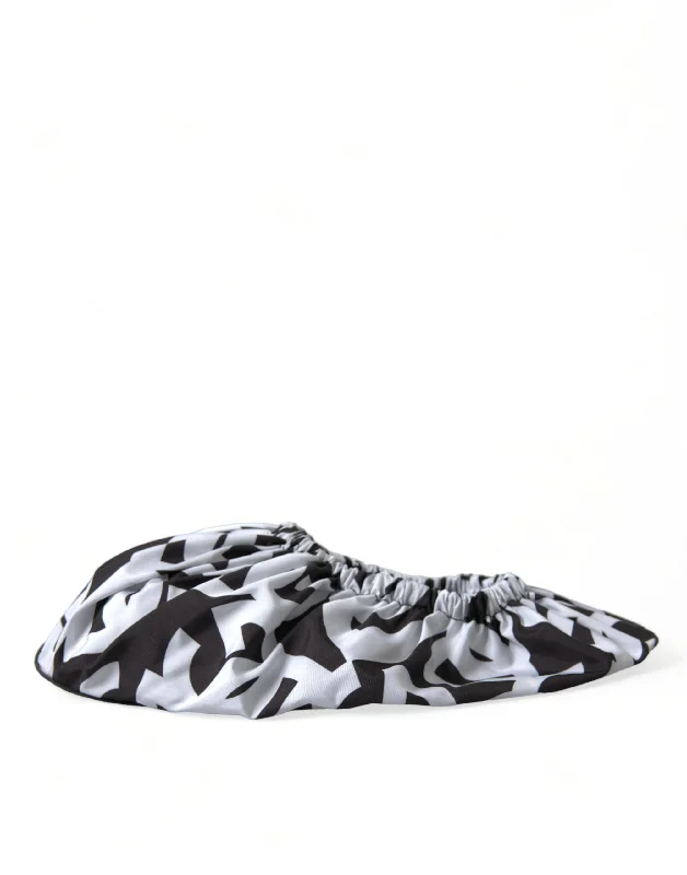 Elegant and sophisticated women's shoes for opera nightsDolce & Gabbana Chic Monochrome Slip-On Women's Flats Elegant and sophisticated women's shoes for opera nightsDolce & Gabbana Chic Monochrome Slip-On Women's Flats
